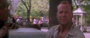 Die Hard with a Vengeance_McClane takes a call in the park