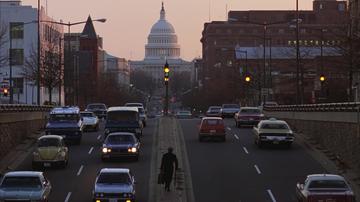 Being There_Chance walking toward the Capitol