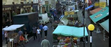 Notting Hill_Will walks through the market