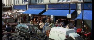 Notting Hill_Will walks past antique shops