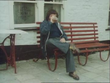 Nuts in May_Ray has a drink at the pub