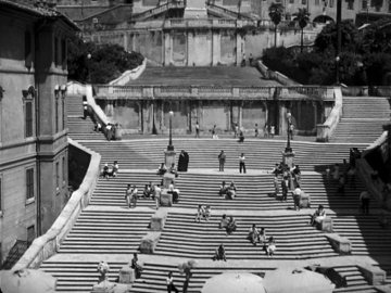 Roman Holiday_Ann stops for an ice cream at the Spanish Steps