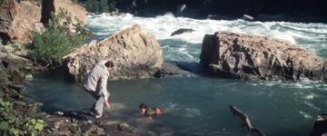 Superman II_Clark helps Lois out of the river