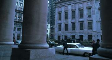 Catch Me If You Can_Frank Sr and Frank Jr pull up in front of the bank