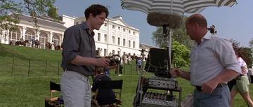 Notting Hill_Will listens to the audio on the film set