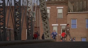 Rocky II_Rocky crosses the bridge and is followed by kids