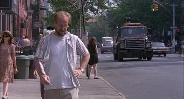 Smoke_Paul walking along the street